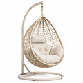 Sedia sospesa a uovo in rattan sintetico con cuscini in poliestere beige
